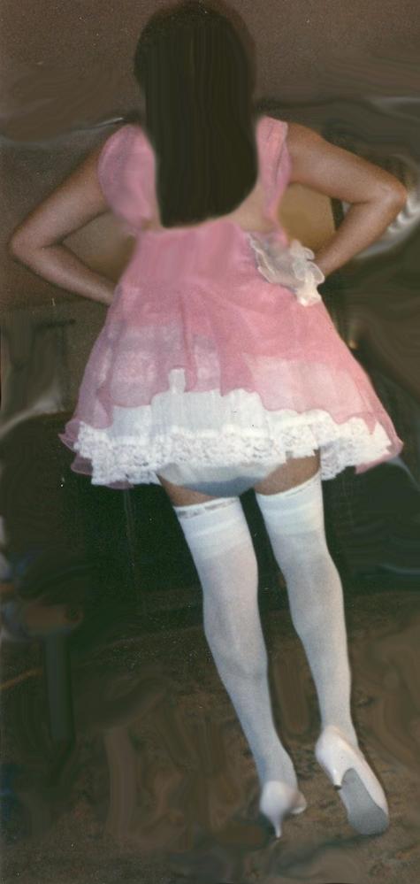 Another reason i quit wearing a disposable "briefs" when i went out somewhere.
I couldn't pull my petticoat down far enough to keep people from seeing the discoloration in the seat of my plastic panties.  Can you?  
Keywords: public_baby_diapered_woman