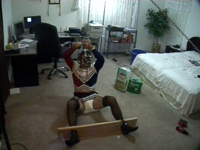 Self bondage in cheerleader uniform, diaper, and head cage.
Self bondage.  Locked in stocks, 2 dulcolax suppositories, while dressed in cheerleader uniform.  I also had my stainless steel head cage locked on.  Chain attached to electromagnetic lock with timer to prevent escape.  IMPOSSIBLE TO ESCAPE FROM, and very uncomfortable.  The only thing to do is wait for the timer to unlock the lock while the laxatives are doing their thing...
