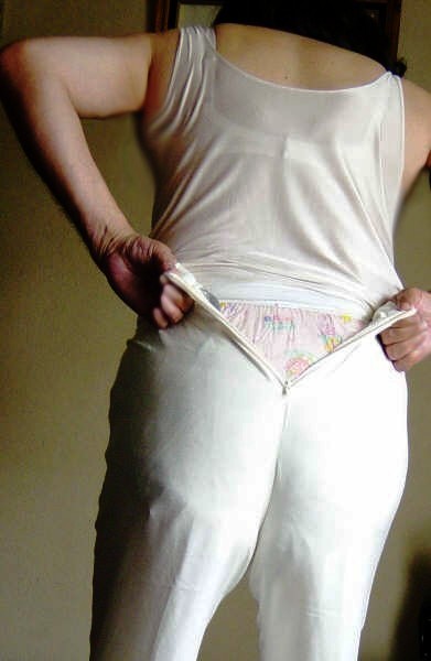 Happiness, is going shopping well diapered and not having to use public restrooms!
Showing my pink babyprint plastic panties over my diapers, before zipping up the rear of my trousers.  I'm used to my "diaper lines" showing through my clothes, but by the time i was made aware of my babyprints showing through the white material of my trousers.  i was already at the mall and too busy with christmas shopping to care what everybody saw.  would you?
Keywords: public_baby_diapered_woman